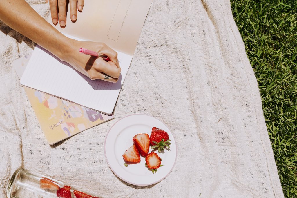Journaling on a picnic blanket